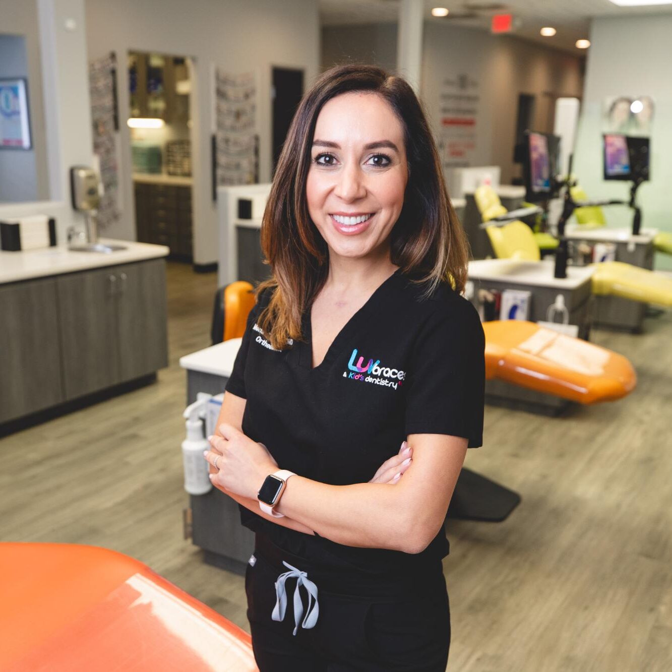 Orthodontist in Luv Braces office, showcasing pediatric dentistry and orthodontics in Austin, Texas.